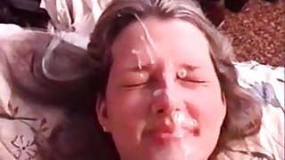 Her sexy face showered with cum